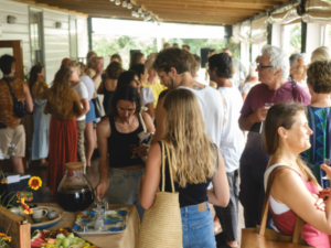 People standing undercover on a verandah