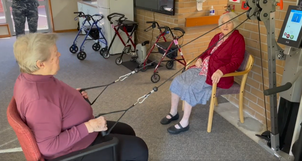 HEADING: Stawell’s home of strength, balance and bingo. IMAGE: two ladies using the exercise equipment.